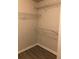 Empty closet features multiple metal shelves, which provide easy storage in an organized space at 75 Oak Hill Dr, Covington, GA 30016