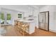 Well-lit kitchen featuring an island with seating, and stainless steel appliances at 770 Wellesley Nw Dr, Atlanta, GA 30305