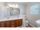 Large bathroom with double sinks and a large mirror at 12237 Cypress Ln, Fayetteville, GA 30215