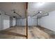 Spacious two car garage with concrete flooring and two garage door openers at 12237 Cypress Ln, Fayetteville, GA 30215