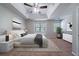 Cozy main bedroom with tray ceiling, carpet flooring and large windows at 12237 Cypress Ln, Fayetteville, GA 30215