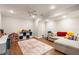 Finished basement with play area, plush sectional sofa, and durable flooring at 1435 Withmere Ln, Atlanta, GA 30338