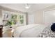 Sun-filled bedroom with large windows, hardwood floors, and ample closet space at 1435 Withmere Ln, Atlanta, GA 30338