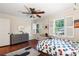 Bright bedroom featuring hardwood floors, updated fixtures, and plenty of natural light at 1435 Withmere Ln, Atlanta, GA 30338