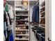 This organized walk-in closet provides ample storage and shelving at 1435 Withmere Ln, Atlanta, GA 30338
