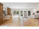 Bright living room with hardwood floors, natural light, built-in cabinets, and view of the backyard at 1435 Withmere Ln, Atlanta, GA 30338