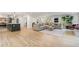 Open floor plan features a seamless transition between kitchen, dining area, and bright and open living room at 1435 Withmere Ln, Atlanta, GA 30338