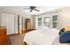 Bright and spacious main bedroom features hardwood floors, bay windows, and closet at 1435 Withmere Ln, Atlanta, GA 30338