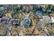 An aerial view showcasing the property's layout, surrounding neighborhood, and in-ground pool at 1608 Carroll Nw Dr, Atlanta, GA 30318