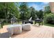 Outdoor space showcases hot tub, seating, and lovely landscaping at 1608 Carroll Nw Dr, Atlanta, GA 30318