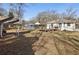 Spacious backyard featuring a wooden deck, shed and partial fence at 1608 Carroll Nw Dr, Atlanta, GA 30318