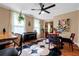 Open-concept dining area with unique seating and bright, airy ambiance at 1608 Carroll Nw Dr, Atlanta, GA 30318