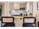 Kitchen bar area with seating, ideal for casual dining or entertaining guests at 1608 Carroll Nw Dr, Atlanta, GA 30318