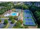 Aerial view of community amenities, including pool, waterpark, tennis courts and parking at 3282 Green Farm Trl, Dacula, GA 30019