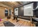 Bright exercise room featuring natural wood accents, modern lighting, and a sleek stationary bicycle at 3282 Green Farm Trl, Dacula, GA 30019