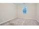 Neutral bedroom with a window and wall-to-wall carpeting at 3652 Silvery Way, Powder Springs, GA 30127