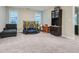 Spacious bonus room featuring a carpeted floor and an entertainment area at 3652 Silvery Way, Powder Springs, GA 30127