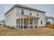 Two-story home features a cozy, screened-in porch overlooking a spacious backyard at 3652 Silvery Way, Powder Springs, GA 30127