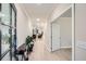 Welcoming foyer showcasing sleek flooring and a view into the home's open-concept living spaces at 3652 Silvery Way, Powder Springs, GA 30127