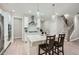 Modern kitchen featuring a center island, stainless steel appliances, and stylish pendant lighting at 3652 Silvery Way, Powder Springs, GA 30127