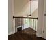 Bright living room with hardwood floors, fireplace, and fan at 5907 Sw Bunting Ln, Atlanta, GA 30331