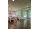 Open floor plan connecting the kitchen, dining area, and living room at 5907 Sw Bunting Ln, Atlanta, GA 30331