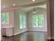 Spacious living room with hardwood floors and an open floor plan at 5907 Sw Bunting Ln, Atlanta, GA 30331