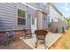 Charming backyard patio with rocking chairs, providing a cozy and relaxing outdoor space at 1227 Herty Dr, Marietta, GA 30062