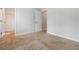 Bedroom with neutral carpet, light walls, and a view to a closet and doorway at 1227 Herty Dr, Marietta, GA 30062