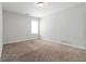 Neutral bedroom has a window providing ample light and carpeting at 1227 Herty Dr, Marietta, GA 30062