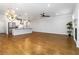 Open concept living room boasts hardwood floors, an island with seating, and modern appliances at 1227 Herty Dr, Marietta, GA 30062