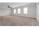 Spacious main bedroom with plantation shutters, neutral carpet, and plenty of natural light at 1227 Herty Dr, Marietta, GA 30062