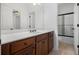 Bathroom features a vanity with dark wood cabinets and a white countertop at 448 Hanover Drive, Villa Rica, GA 30180