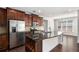 Modern kitchen with stainless steel appliances, granite countertops, and a spacious center island at 448 Hanover Drive, Villa Rica, GA 30180