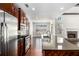 Well-equipped kitchen with stainless steel appliances and stone countertops, seamlessly connected to living spaces at 448 Hanover Drive, Villa Rica, GA 30180