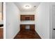 Dedicated office space with custom built-ins and a dark wood floor at 448 Hanover Drive, Villa Rica, GA 30180