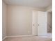 Cozy bedroom with closet and neutral carpeting providing a comfortable and functional living space at 4812 Browns Mill Ferry Rd, Lithonia, GA 30038