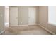 Relaxing bedroom features carpeted floors, two doors, and a window with natural light, promoting calmness at 4812 Browns Mill Ferry Rd, Lithonia, GA 30038