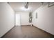 Spacious garage with epoxy flooring, water heater and ample room for parking and storage at 4812 Browns Mill Ferry Rd, Lithonia, GA 30038