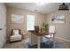 Bright, staged office with a modern desk, chair, and decor, creating an inviting workspace at 4812 Browns Mill Ferry Rd, Lithonia, GA 30038