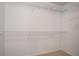 Walk-in closet with white wire shelving for optimal storage at 4812 Browns Mill Ferry Rd, Lithonia, GA 30038