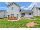 View of the backyard showing a patio with an outdoor dining set at 4889 Hidden Creek Pl, Decatur, GA 30035