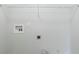 Simple laundry room featuring hookups and storage at 4889 Hidden Creek Pl, Decatur, GA 30035