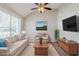 Bright living room featuring high ceilings and natural light at 4889 Hidden Creek Pl, Decatur, GA 30035