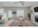 Inviting living room with cozy seating, fireplace, and elegant decor for relaxation and entertaining at 4889 Hidden Creek Pl, Decatur, GA 30035