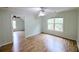 Bedroom with wood laminate flooring, neutral paint, and a ceiling fan at 1425 Turtle Dove Ln, Lawrenceville, GA 30043