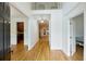 Bright foyer with hardwood floors, neutral walls, and high ceilings at 1425 Turtle Dove Ln, Lawrenceville, GA 30043