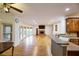 Spacious living room with hardwood floors, fireplace, and large windows that bring in a lot of natural light at 1425 Turtle Dove Ln, Lawrenceville, GA 30043