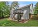 Backyard featuring a deck, patio, and lush greenery, perfect for outdoor entertaining and relaxation at 144 Boones Ridge Se Pkwy, Acworth, GA 30102