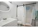 Modern bathroom featuring a vanity with a sink, toilet, and shower with modern sliding door at 144 Boones Ridge Se Pkwy, Acworth, GA 30102